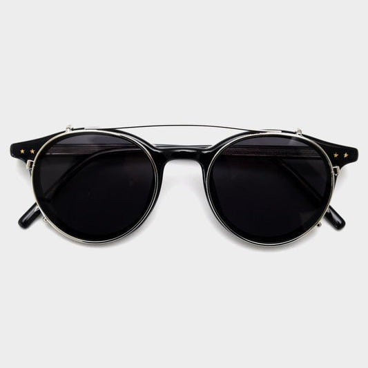 MieMie's versatile oval frame glasses, featuring a detachable polarized clip-on for instant transition between prescription eyewear and sunglasses. All-in-One lenses come with multi-coating benefits: anti-blue light, anti-allergic, anti-scratch, anti-glare, and oil-resistant protection, all included at one price